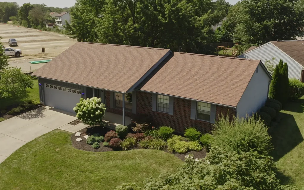 Image of a ranch home with a new roof replacement installed by Able Roofing completed with Owens Corning Duration shingles.